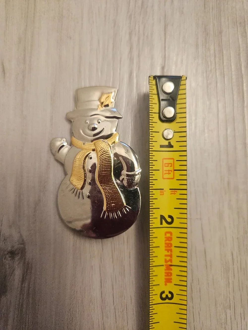 Vintage Hallmark Christmas two-tone gold and silver-plated snowman Brooch